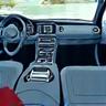 Icon of a car's interior with a wallet and phone, symbolizing personal belongings coverage.