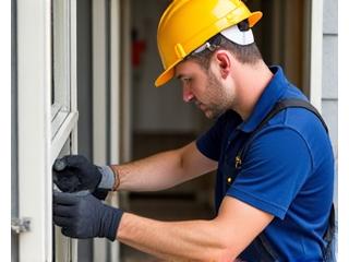 Skilled tradesperson working diligently with tools at a residential construction site in Australia